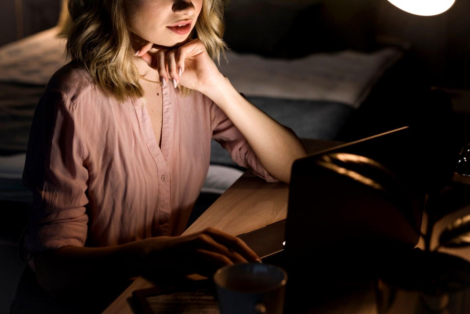 Person reviewing financial documents and planning their investment strategy